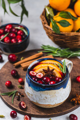 Cranberry non-alcoholic mulled wine in a mug
