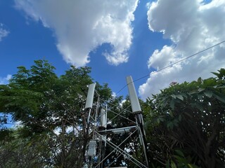 sky, tower, blue, industry, clouds, chimney, power, smoke, factory, energy, cloud, antenna, building, pollution, landscape, metal, industrial, architecture, windmill, technology, air, nature, pipe, 