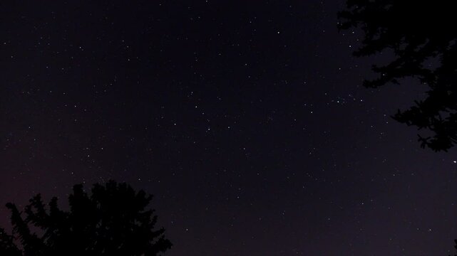 Aurora Borealis glows faintly in Pennsylvania during an active solar storm.