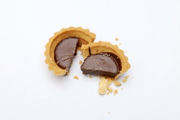 Tart chocolate isolated on white, selective focus on subject