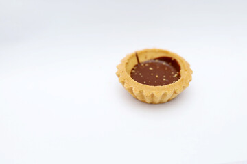 Tart chocolate isolated on white, selective focus on subject