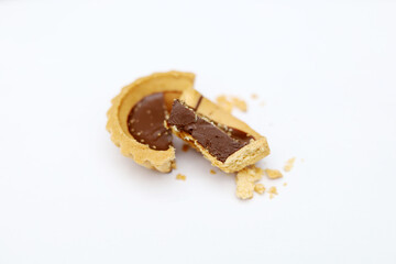 Tart chocolate isolated on white, selective focus on subject