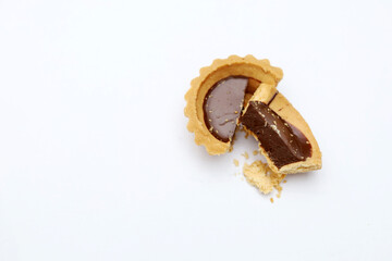 Tart chocolate isolated on white, selective focus on subject