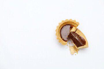 Tart chocolate isolated on white, selective focus on subject