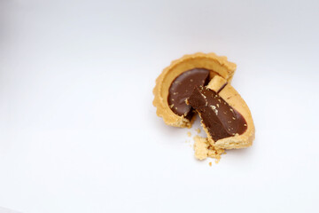 Tart chocolate isolated on white, selective focus on subject