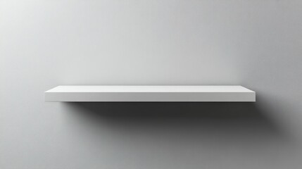 Minimalist background for product display featuring a white shelf against a soft gray wall