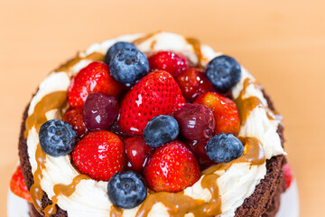 Strawberry and blueberry chocolate birthday cake