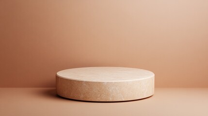 A simple, beige circular podium on a matching backdrop, creating a minimalist aesthetic for displaying products or art.