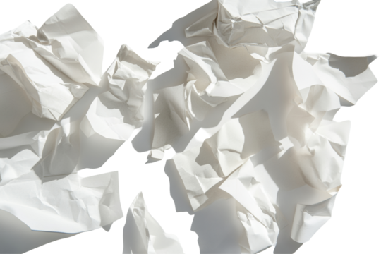 A visually appealing arrangement of scattered papers in different angles and positions, isolated on a stark white background, showcasing the beauty of randomness.