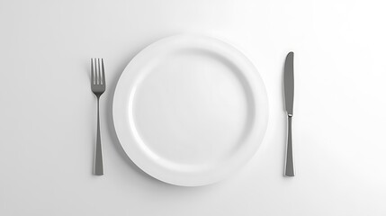 A white plate, fork, and knife are arranged on a light surface.