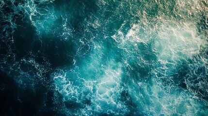 Aerial view of ocean waves crashing