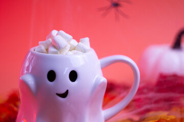 Ghost mug filled with marshmallows.