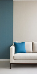 Modern living room with a neutral sofa and vibrant blue pillow on textured walls