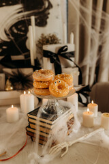 Spooky Donuts on Vintage Book Stack