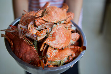 Close-up view of steamed Blue crab in bowl
