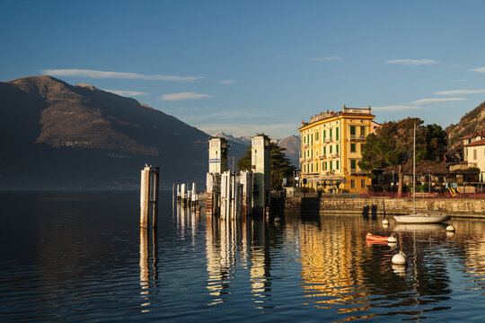 Cruise dock and yellow building in Varenna, Lombardy, Italy