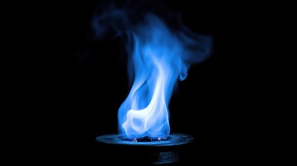 A blue flame flickers above a dark surface, creating an ethereal and mystical atmosphere.