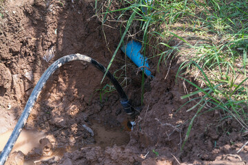 Underground water pipe damage caused by excavator in the wrong location