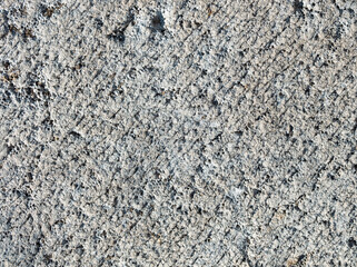 A grey and white concrete surface with a lot of texture
