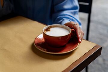 Woman drinking fresh brewed coffee