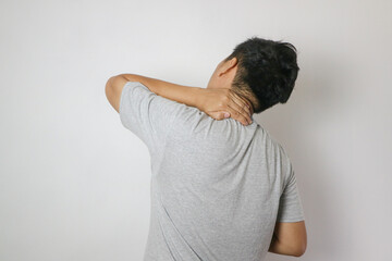 Asian man has problem with structural posture He had neck and back pain. He massaged him neck and...