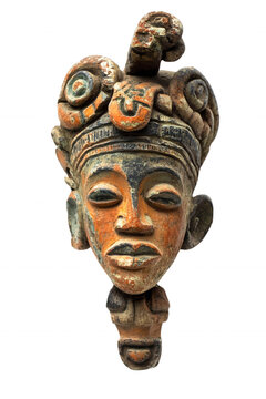 A traditional African mask with intricate details, featuring a stylized human face and a crown-like headdress, isolated on transparent or white background