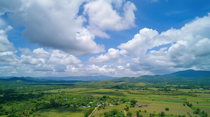 Naklejka premium The allure of a landscape filled with the beauty of blue sky, fluffy white clouds, majestic high mountains, and vibrant green plants. Generative AI