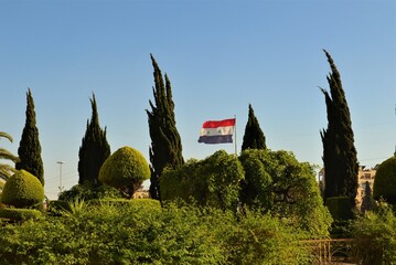 The flag of the Syrian Arab Republic is flying. Syria