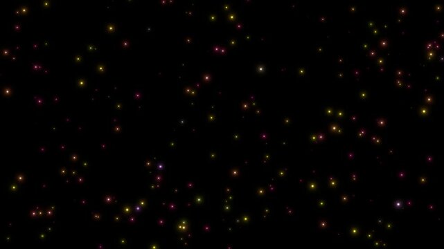 Animation yellow, pink firefly particles glowing sparkles on dark background.