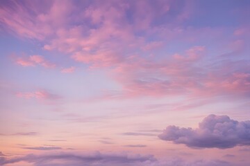 A pastel pink and purple sky at dawn with soft clouds and a gentle early morning glow, Ai Generated