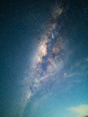 Landscape with Milky way galaxy over Mount Bromo volcano in Bromo Tengger Semeru National Park, East Java, Indonesia. Night sky with stars. Long exposure photograph.