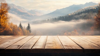 Empty wooden tabletop ideal for displaying products with a serene misty mountain valley backdrop during autumn