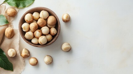 Top view of organic macadamia nuts on a white table