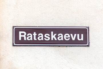 old enamel streetname Rataskaevu in Tallinn, Estonia at an old wall in the old town