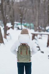 Woman tourist with snow in winter season at Zao fox village, traveler sightseeing Miyagi prefecture. landmark and popular for attraction near Sendai, Tohoku, Japan. Travel and Vacation