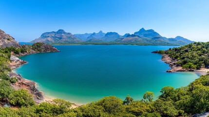 Secluded Tropical Bay with Turquoise Waters and Lush Mountains