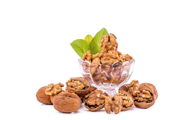 A White Bowl Filled with Shelled Walnuts
