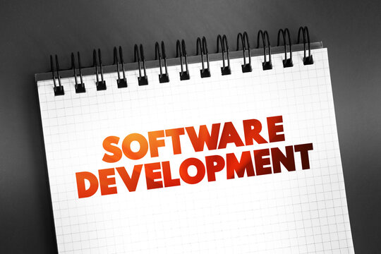 Software Development - set of computer science activities dedicated to the process of creating, designing and supporting software, text on notepad