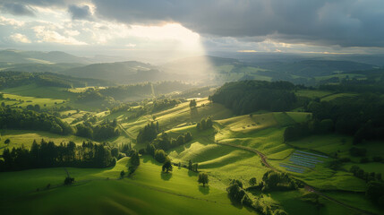 Fototapeta premium breathtaking landscape showcasing rolling green hills under dramatic sky, with sunlight breaking through clouds, creating serene and peaceful atmosphere