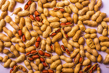 Peanuts without shell background. The view from the top.