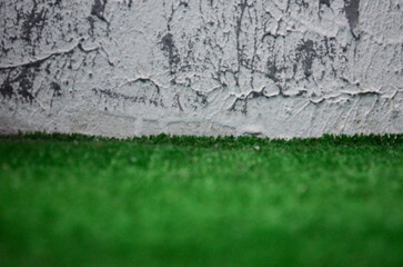 A wall with a white background and a green border.
