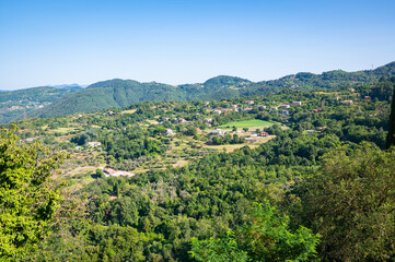 Naklejka premium The small village of Gignola in the beautiful hilly landscape of northern Tuscany, Italy