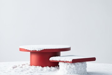 Red snow-covered podium and platform in winter setting