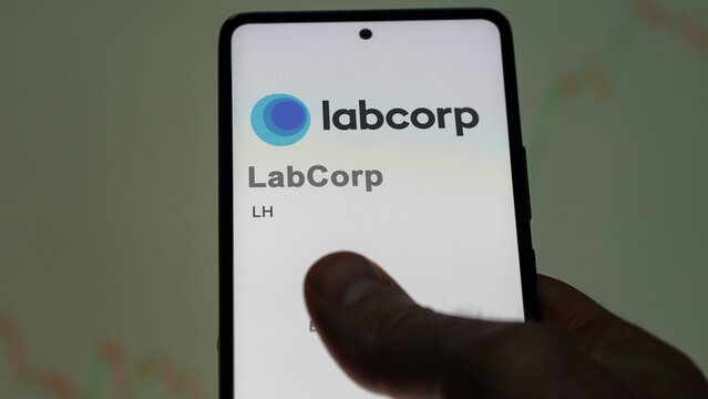 April 09th 2024 , Burlington, North Carolina. Close up on logo of LabCorp on the screen of an exchange. LabCorp price stocks, $LH on a device.