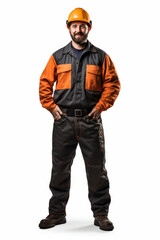 Fototapeta premium Friendly male welder in professional uniform with safety gear posing confidently