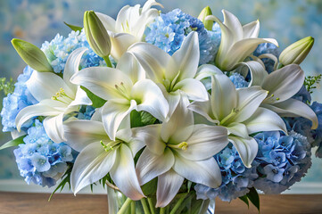 Fototapeta premium A vibrant bouquet of white lilies and blue hydrangeas, elegantly arranged and set against a softly blurred background.