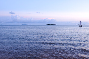 lighthouse in the sea far away