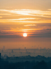 Fototapeta premium Air pollution during the day on vertical photography 6.