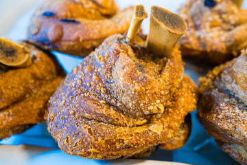 Crispy Fried Pork Knuckle.A Culinary Delight with Golden Brown Skin and Tender Meat