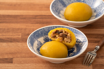Sweet potato yam bun with ground pork meat, mushroom and chopped bamboo shoot fillings inside.